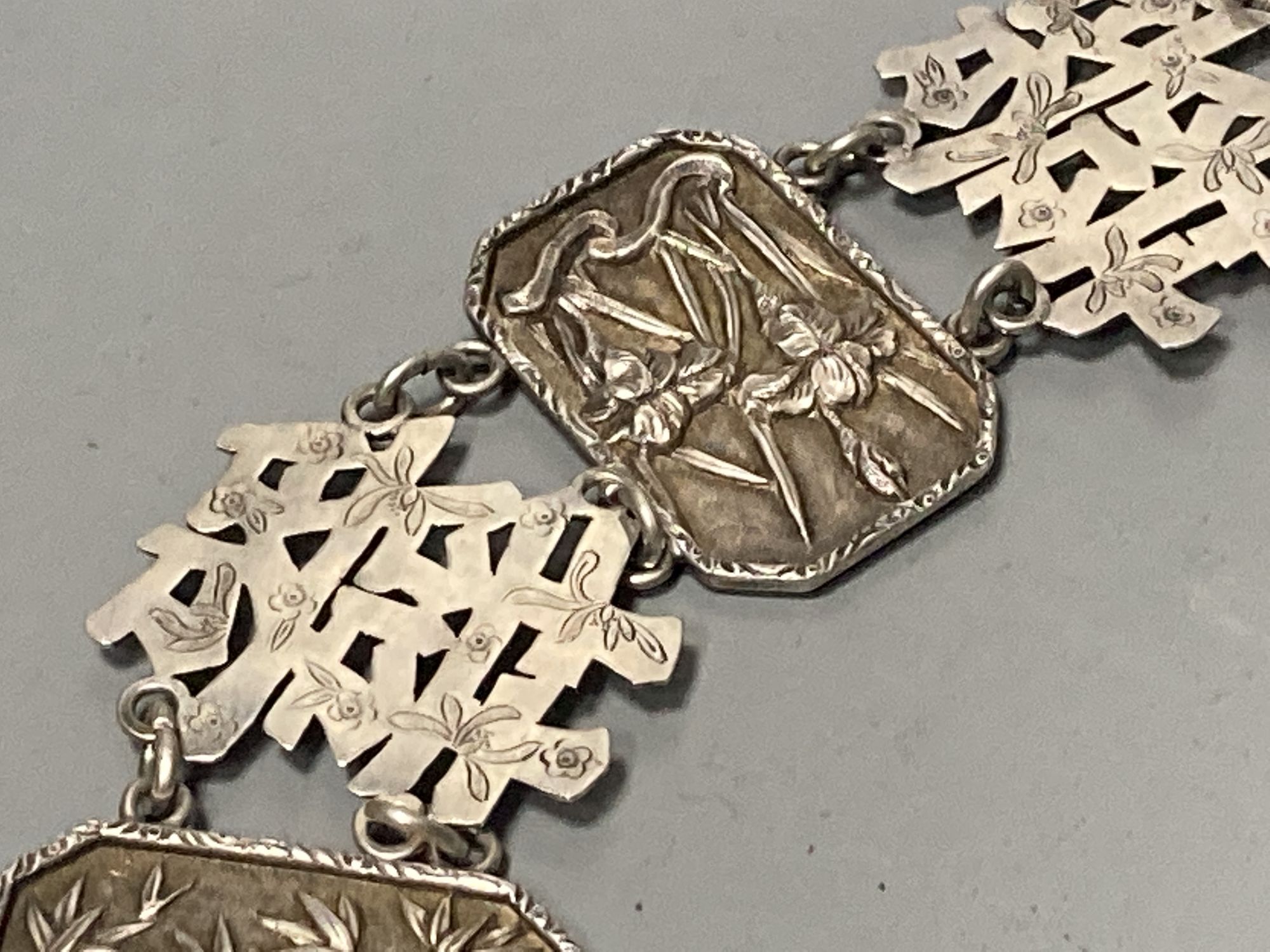 A late 19th century Chinese white metal wedding belt, by Cumwo, 83.5cm, 197 grams.